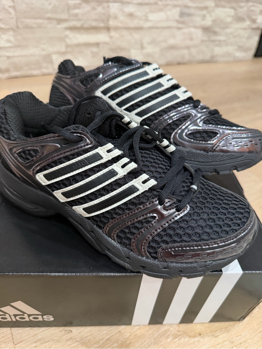 adidas Black Sneakers with White Stripe Accents